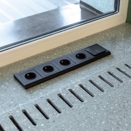 Розетка с заземлением, без рамки Werkel черный матовый W1171008