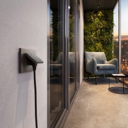 Розетка влагозащищенная с заземлением и со шторкой, без рамки с крышкой Werkel графит рифленый W1171204